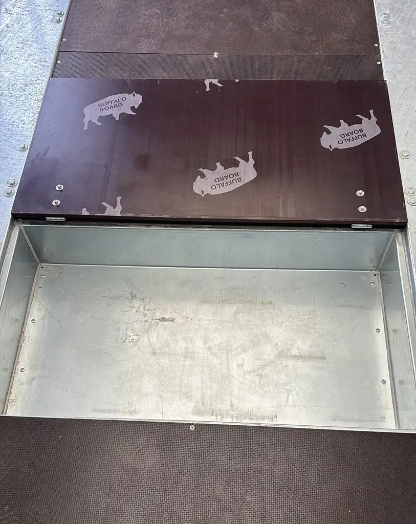 Medium under floor storage bins