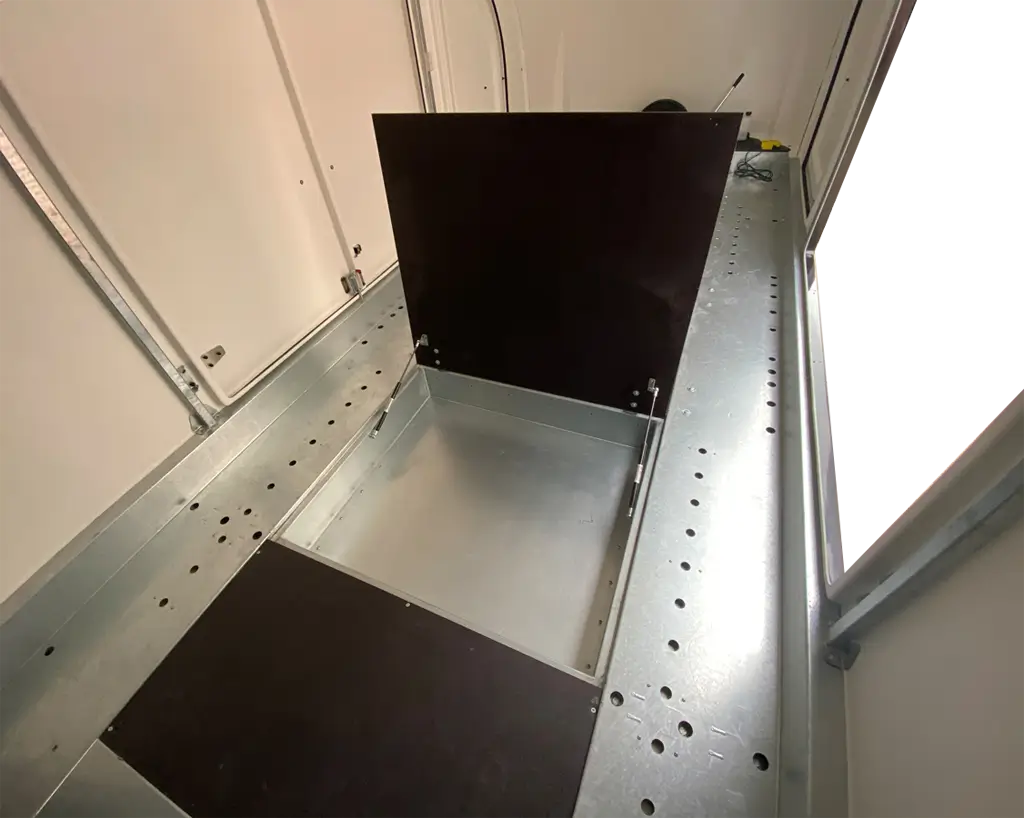 Large under floor storage bins